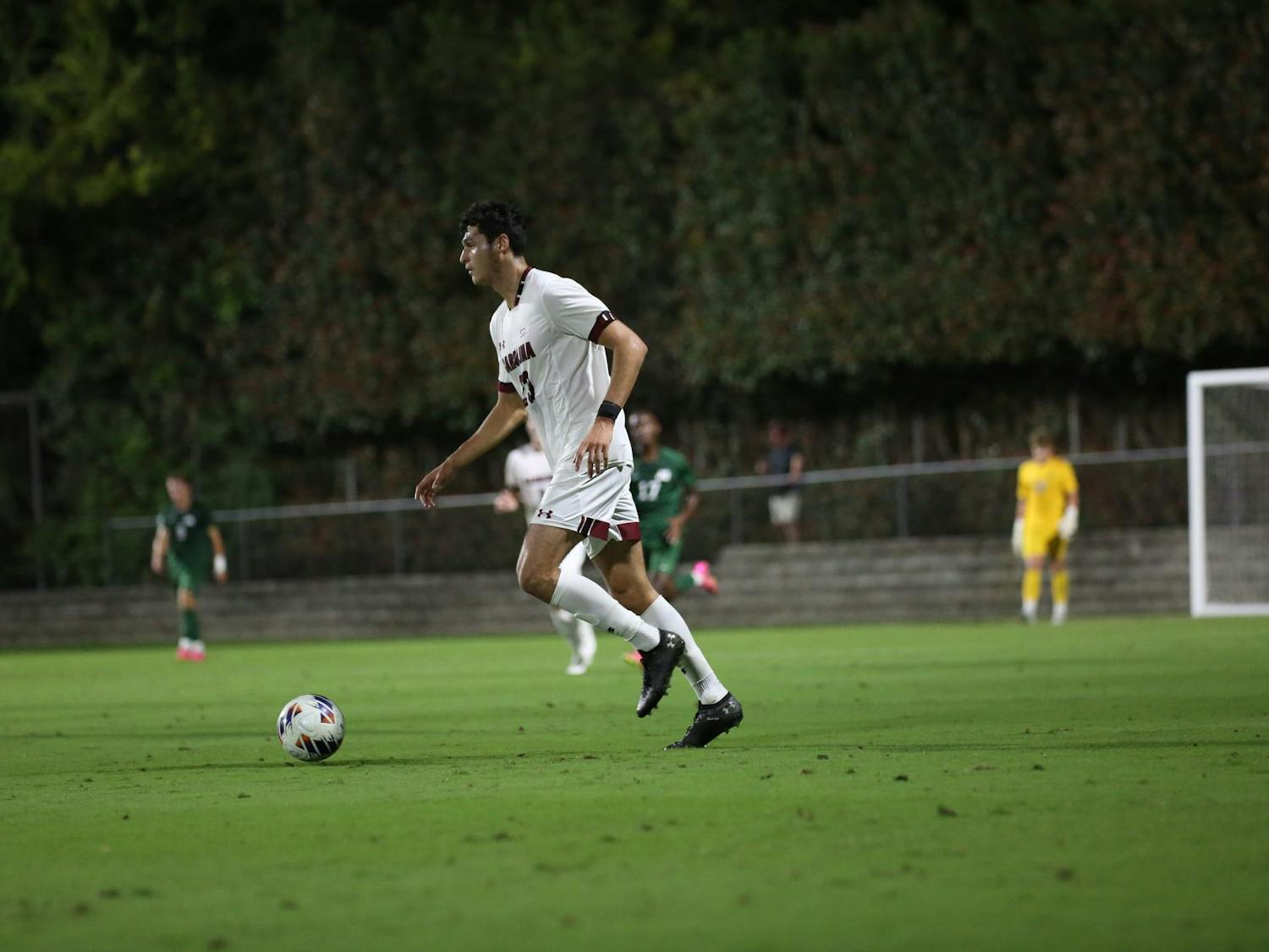Junior forward Harrison Myring runs to pass to a teammate near the goal during a game against Jacksonville University on Oct. 3, 2023. The Gamecocks defeated the Dolphins 1-0.