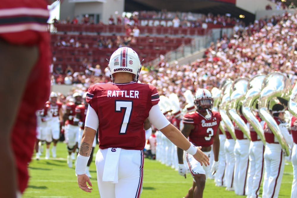 <p>FILE—Spencer Rattler makes his way onto the field at the start of the Gamecock's game against the Georgia Bulldogs on Sept. 17, 2022. Georgia defeated South Carolina 48-7.</p>