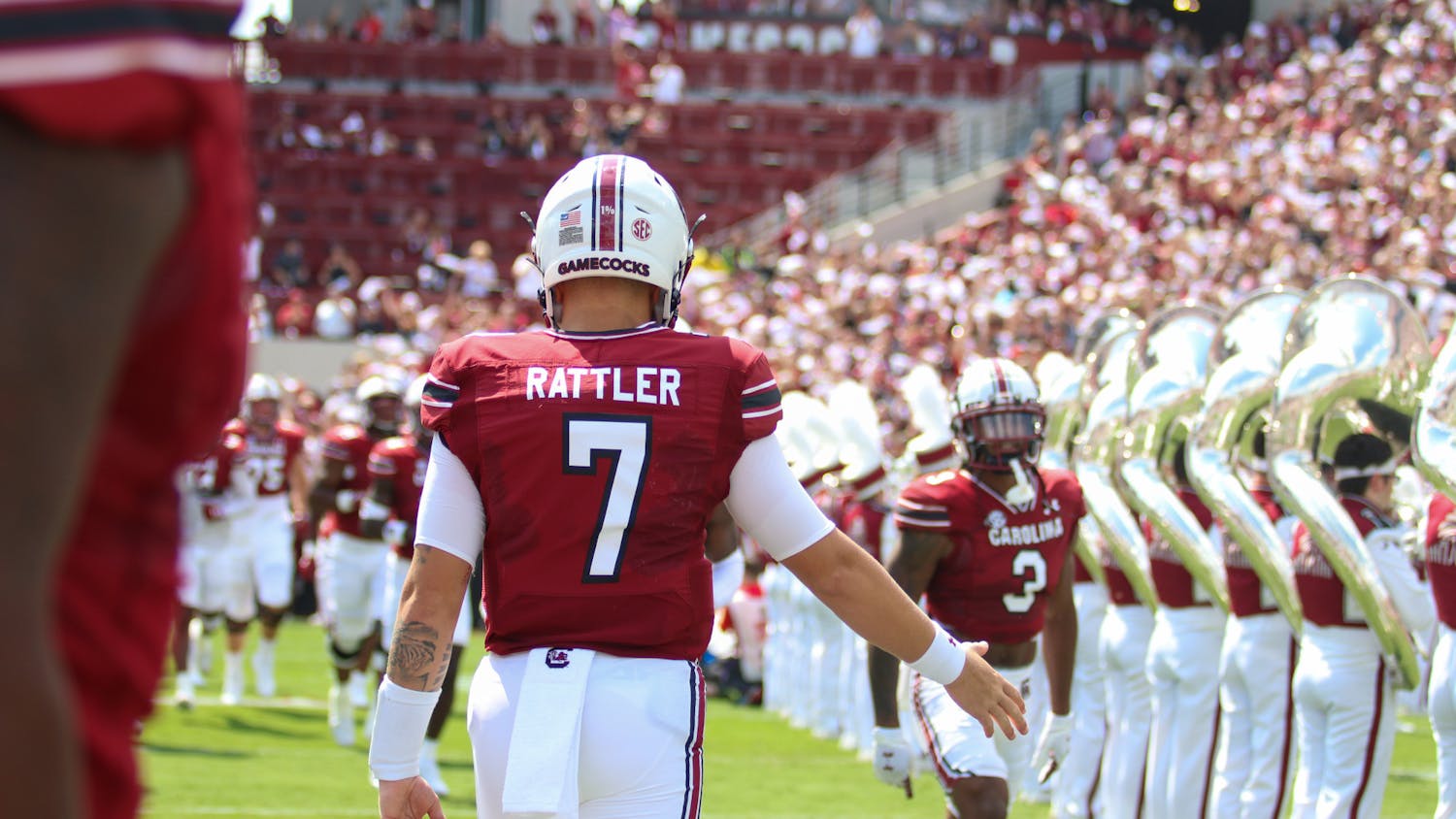 FILE—Spencer Rattler makes his way onto the field at the start of the Gamecock's game against the Georgia Bulldogs on Sept. 17, 2022. Georgia defeated South Carolina 48-7.