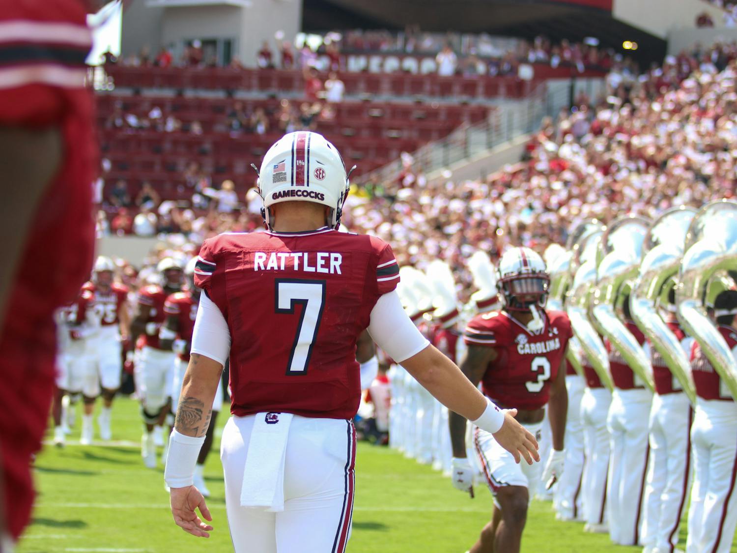FILE—Spencer Rattler makes his way onto the field at the start of the Gamecock's game against the Georgia Bulldogs on Sept. 17, 2022. Georgia defeated South Carolina 48-7.