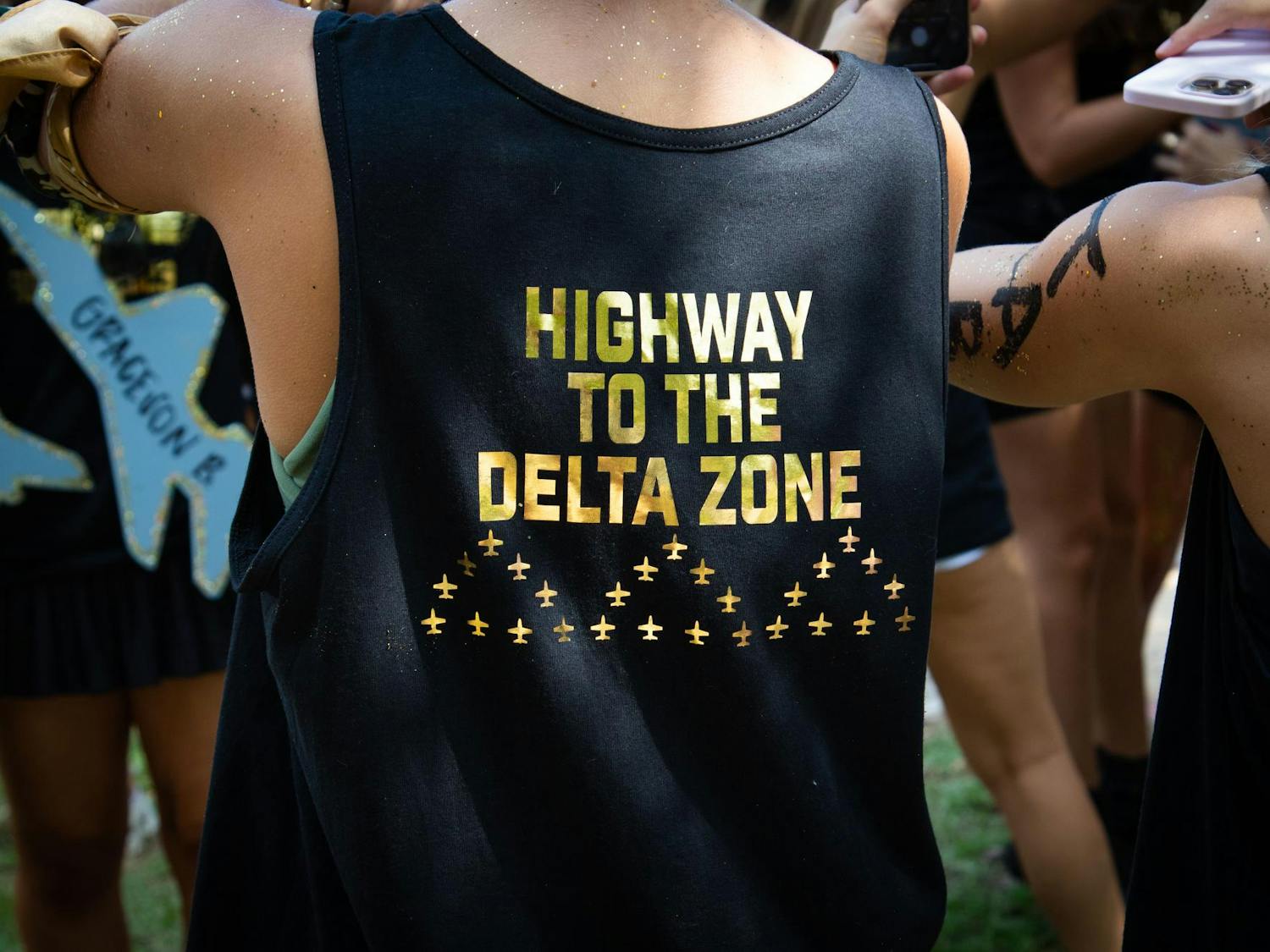 A member of Delta Delta Delta wears a t-shirt on Aug. 27, 2023, displaying the chapter's Bid Day theme. Bid Day marks the final day of sorority recruitment at the University of South Carolina.