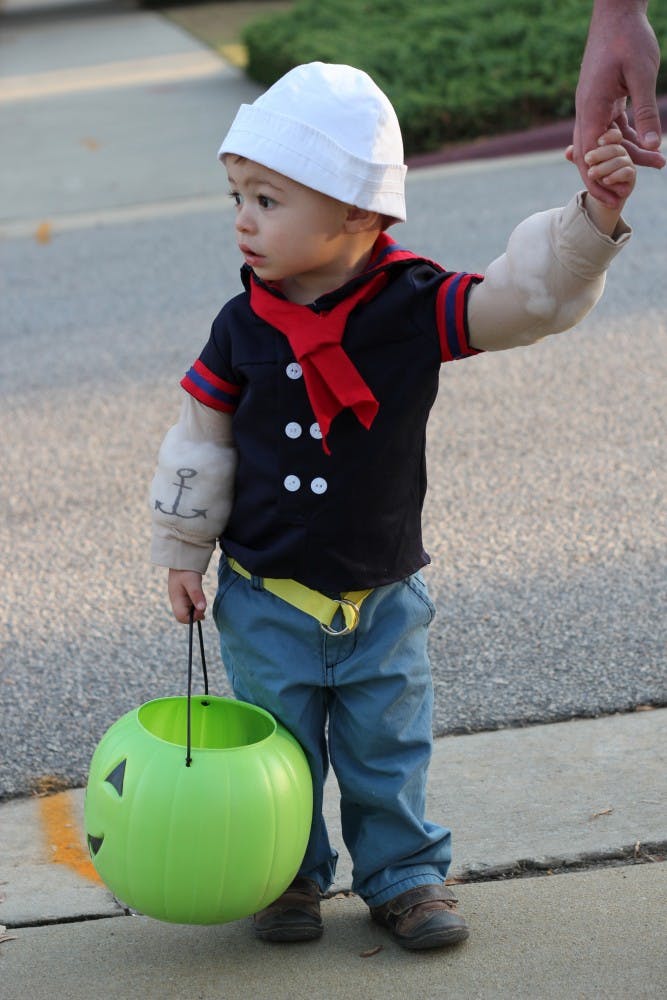 Children of USC faculty and staff as well as the surrounding neighborhood participating in Trick-or-Treat with the Greeks, an annual event where students from Greek organization give out candy and play games with the children.