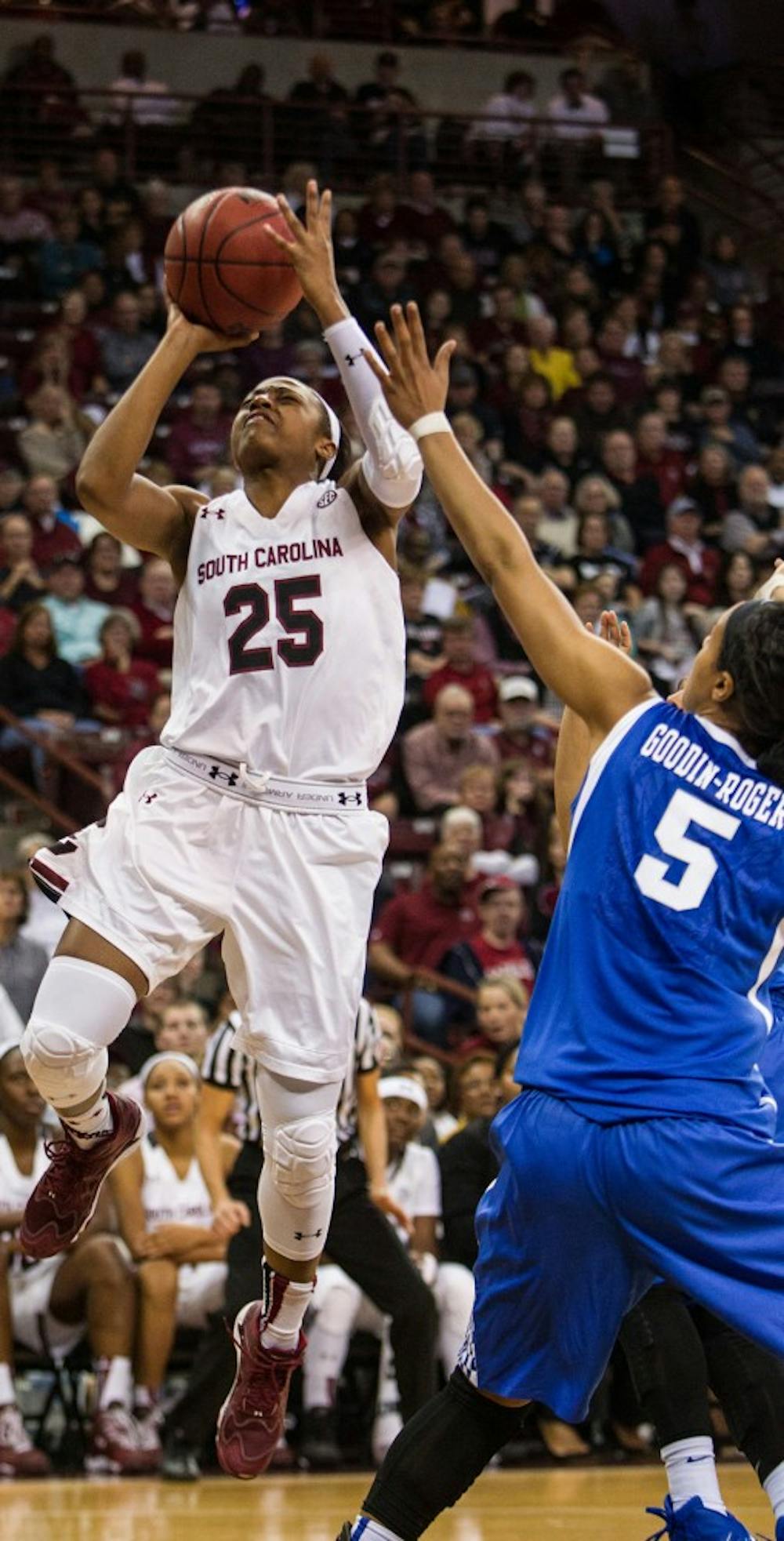 South Carolina&apos;s Tiffany Mitchell (25) shoots over Kentucky&apos;s Kyvin Goodin-Rogers (5) during the first half at the Colonial Life Arena in Columbia, S.C., on Sunday, Jan. 11. 2015. South Carolina won, 68-60. (Tracy Glantz/The State/TNS)