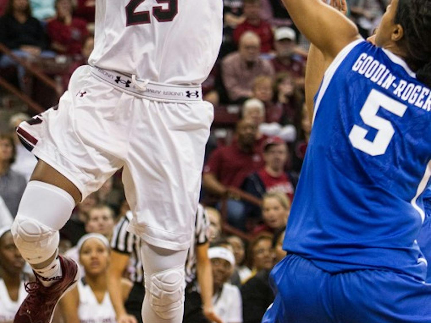South Carolina's Tiffany Mitchell (25) shoots over Kentucky's Kyvin Goodin-Rogers (5) during the first half at the Colonial Life Arena in Columbia, S.C., on Sunday, Jan. 11. 2015. South Carolina won, 68-60. (Tracy Glantz/The State/TNS)