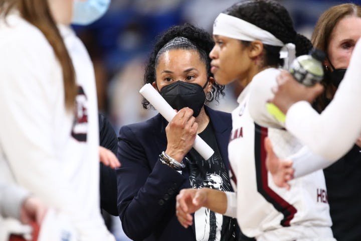 Dawn Staley coaches from the sidelines during the NCAA Regional Final game against Texas.