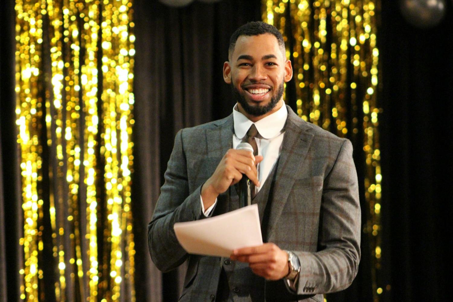 Mike Johnson smiles for the crowd while hosting The Dating Game presented by Carolina Productions and freshman council Feb. 19, 2020.
