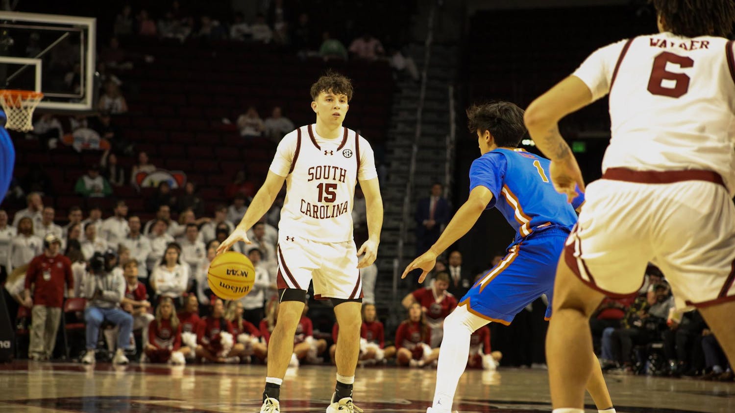 Freshman guard Eli Ellis stands on the court with a basketball in hand Jan. 28, 2026, at the Colonial Life Arena. Ellis scored 13 points for the Gamecocks, now totaling to 232 points for this season.