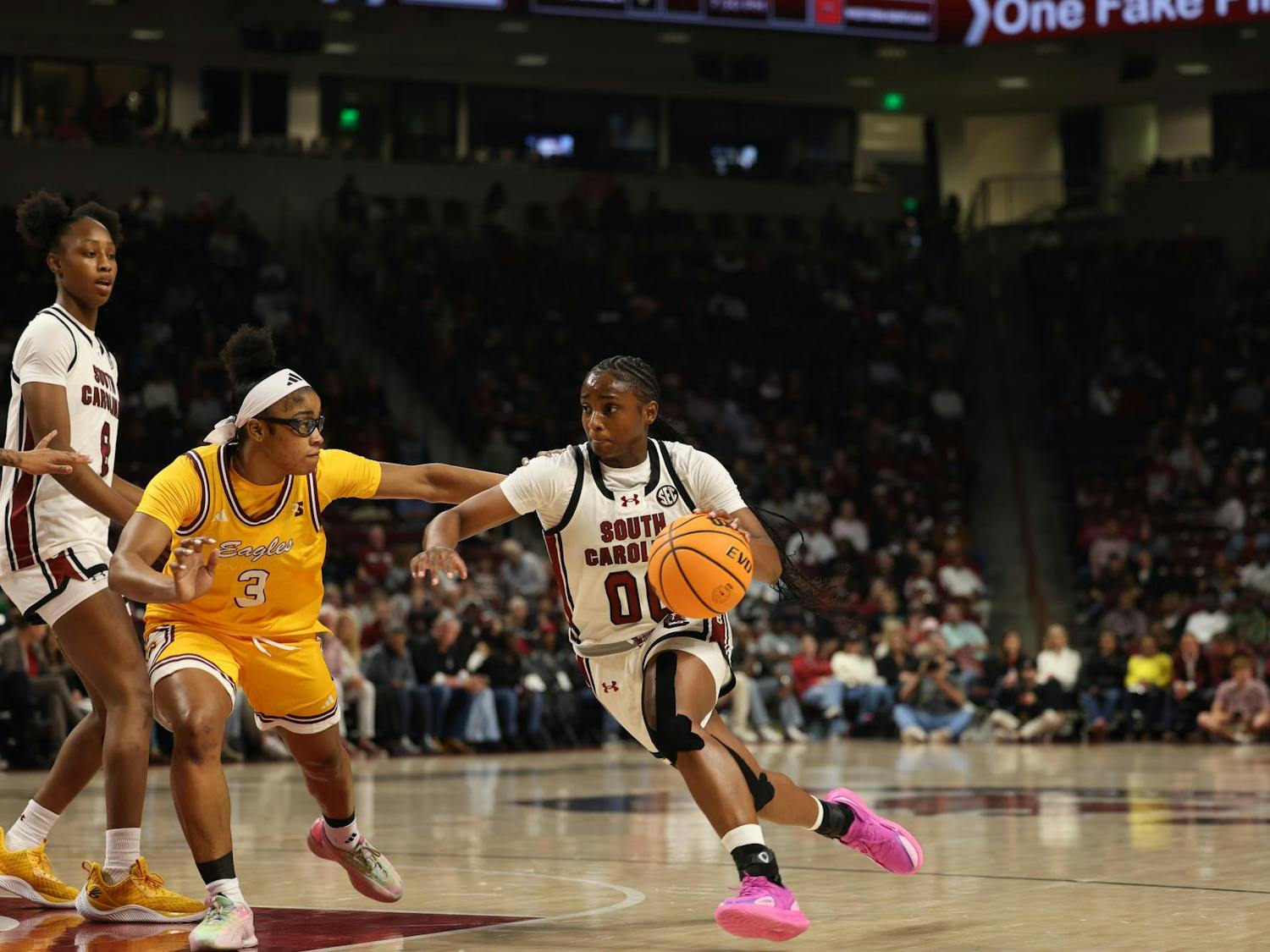 Senior guard Ta'Niya Latson goes straight to the basket against a Winthrop defender at Colonial Life Arena on Nov. 19, 2025