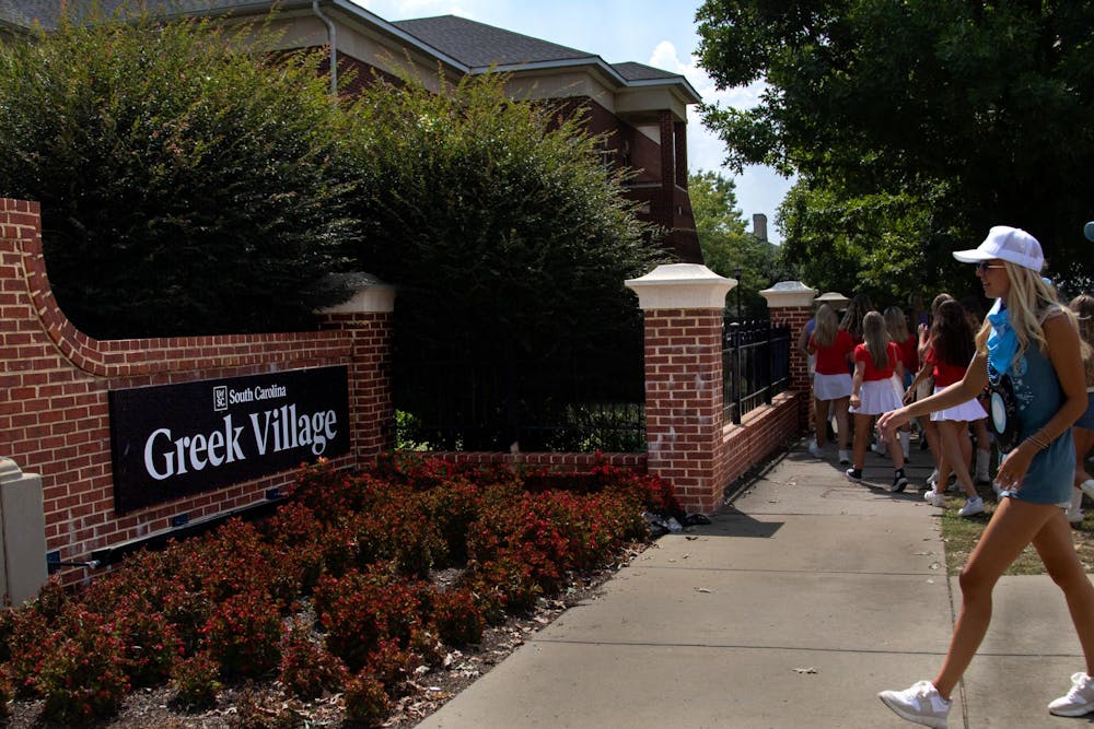 <p>FILE — University of South Carolina sorority members walk into Greek Village on Aug. 27, 2023. ɫɫƵ is looking for ways to expand Greek Village so that more fraternities and sororites can have a house on campus. </p>