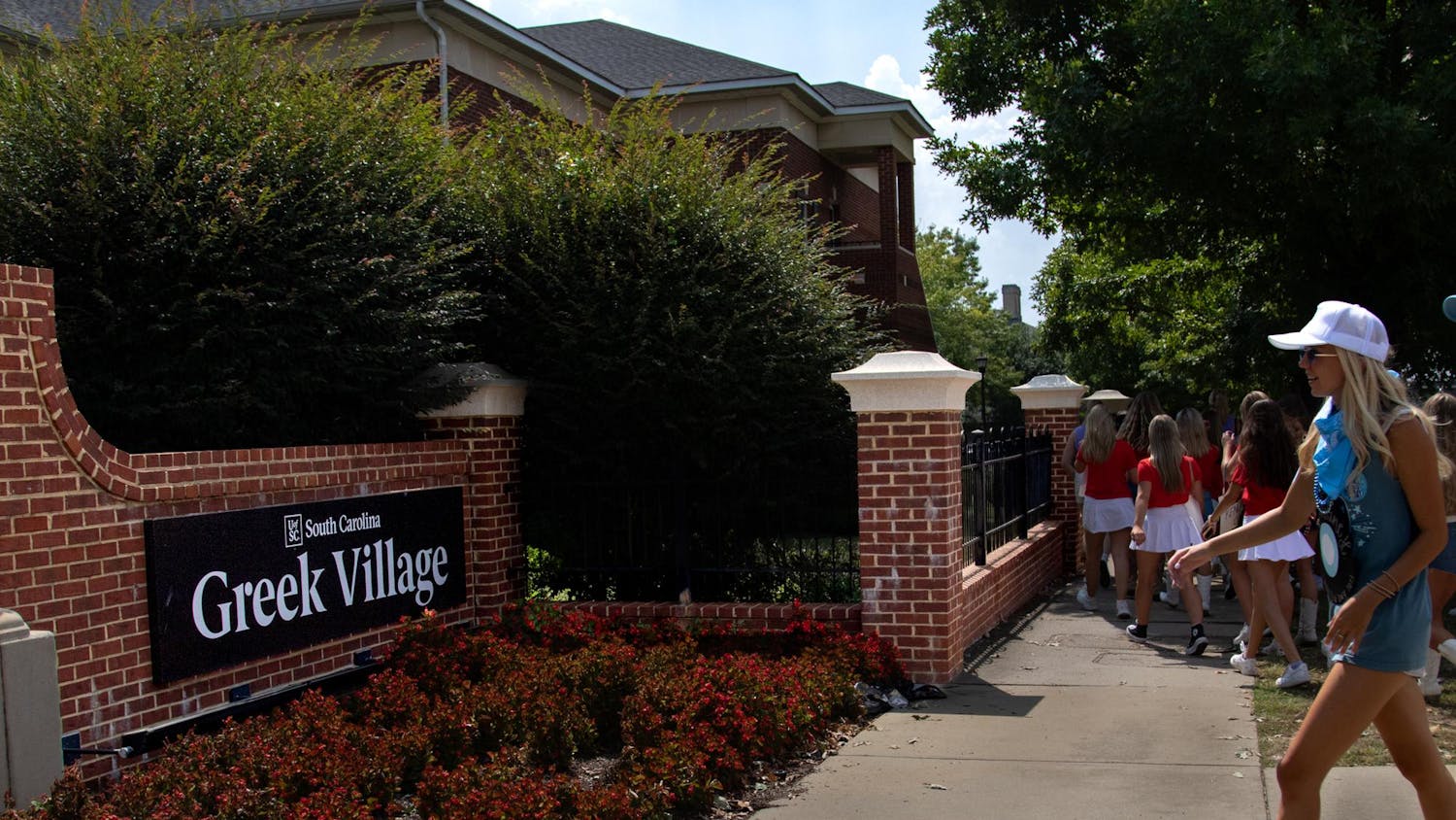 FILE — University of South Carolina sorority members walk into Greek Village on Aug. 27, 2023. USC is looking for ways to expand Greek Village so that more fraternities and sororites can have a house on campus. 