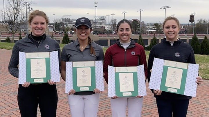 Four members of the South Carolina women’s golf team pose with their invitations to the 2021 Augusta National Women's Amateur tournament.