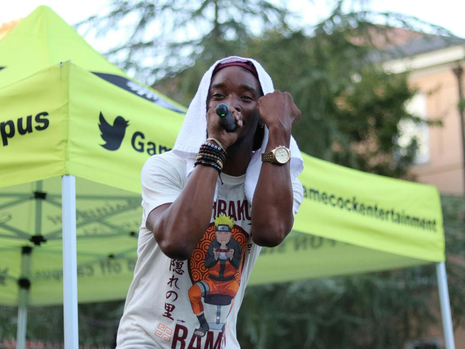A performer shows off his jewelry during First Night Carolina on Aug. 19, 2024. The event saw appearances from Dawn Staley, Lamont Paris and Shane Beamer, among others.