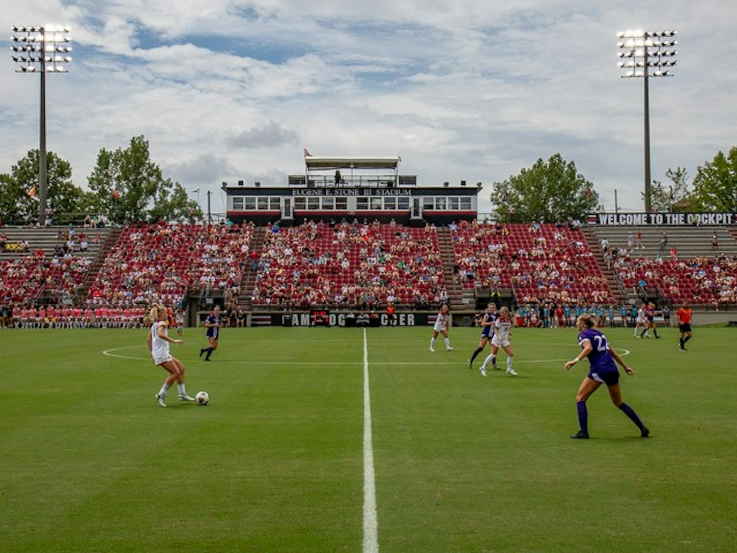 The South Carolina women's soccer team moves the ball along the midfield line during its game against East Carolina on August 21, 2022. The Gamecocks beat the pirates 2-0.