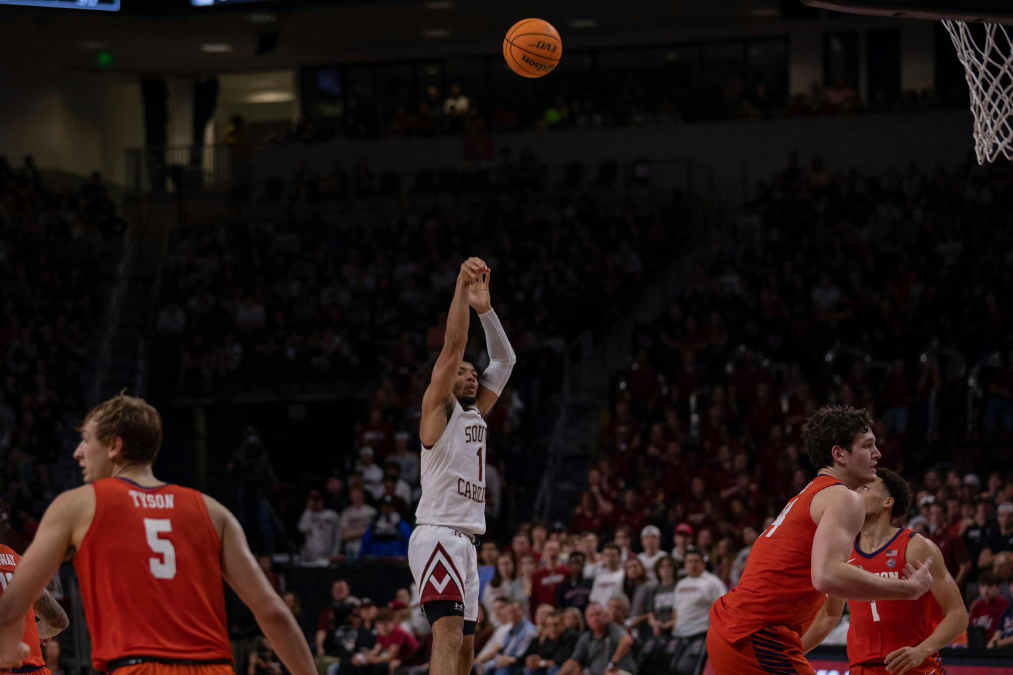 Sophomore guard Jacobi Wright attempts a 3-point shot to keep the Gamecocks ahead of Clemson on Nov. 11, 2022. The Gamecocks beat the Tigers 60-58.&nbsp;
