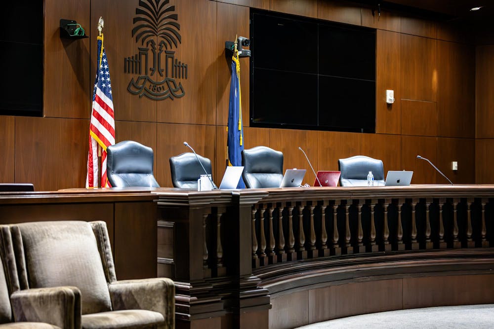 <p>An array of four justices chairs sit behind the judges bench in the Judge Karen J. Williams Courtroom at the USC School on Law on Feb. 25, 2025. The candidates for student government came together to dispute various complaints regarding campaign violations before a panel of four student justices.</p>