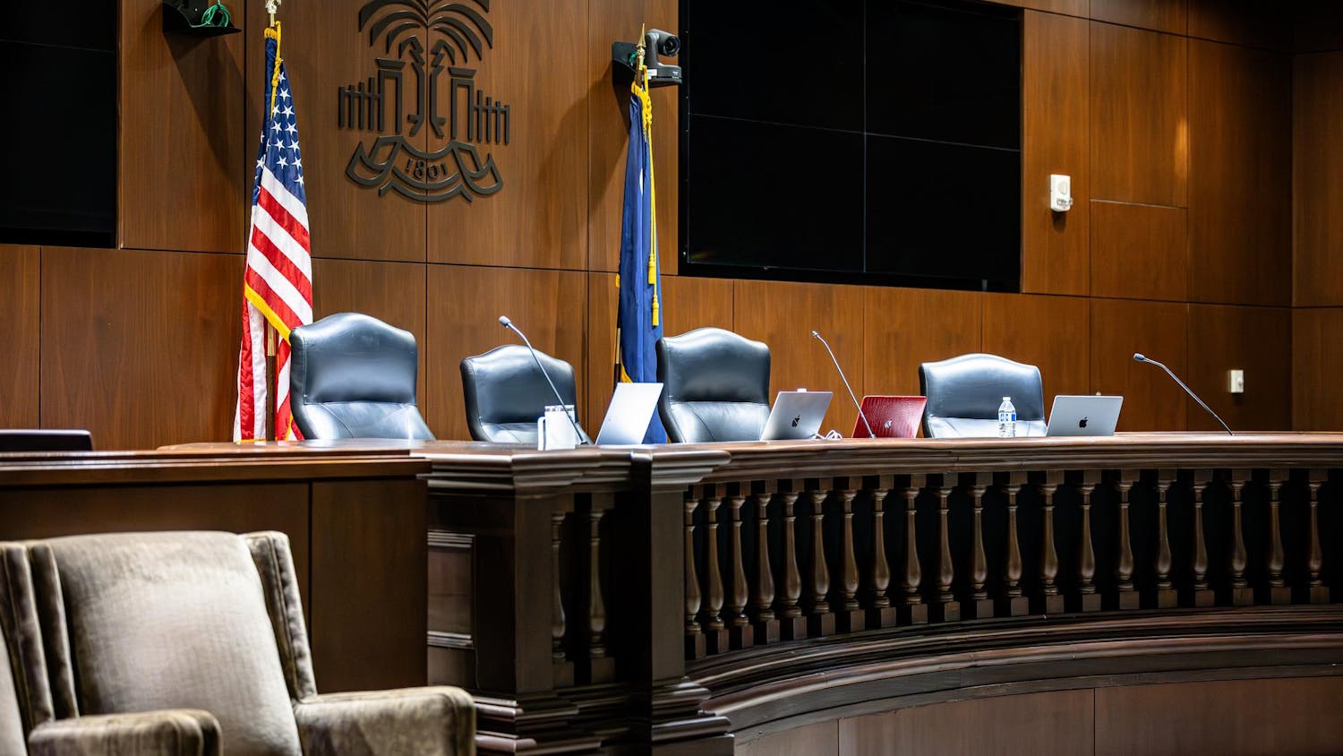 An array of four justices chairs sit behind the judges bench in the Judge Karen J. Williams Courtroom at the USC School on Law on Feb. 25, 2025. The candidates for student government came together to dispute various complaints regarding campaign violations before a panel of four student justices.