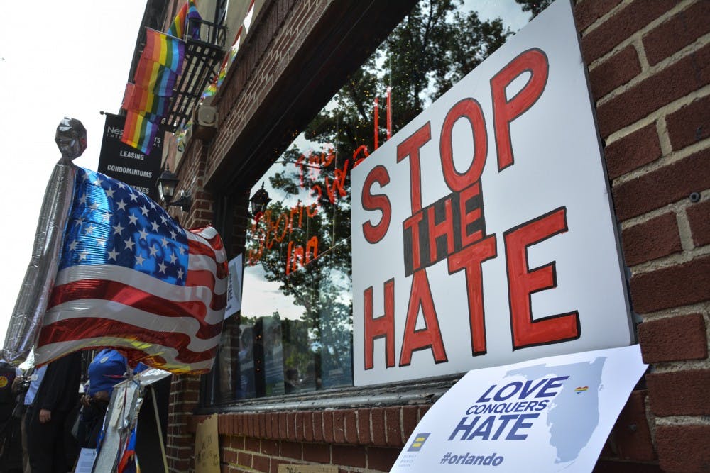 Mourners hold a vigil Monday night at The Stonewall Inn in New York, a national historic landmark due to its role in the LGBT civil rights movement. Sunday's massacre at Orlando's Pulse nightclub has led to an outpouring of grief and support all around the United States. The attack on the gay bar was the worst mass shooting in U.S. history. 