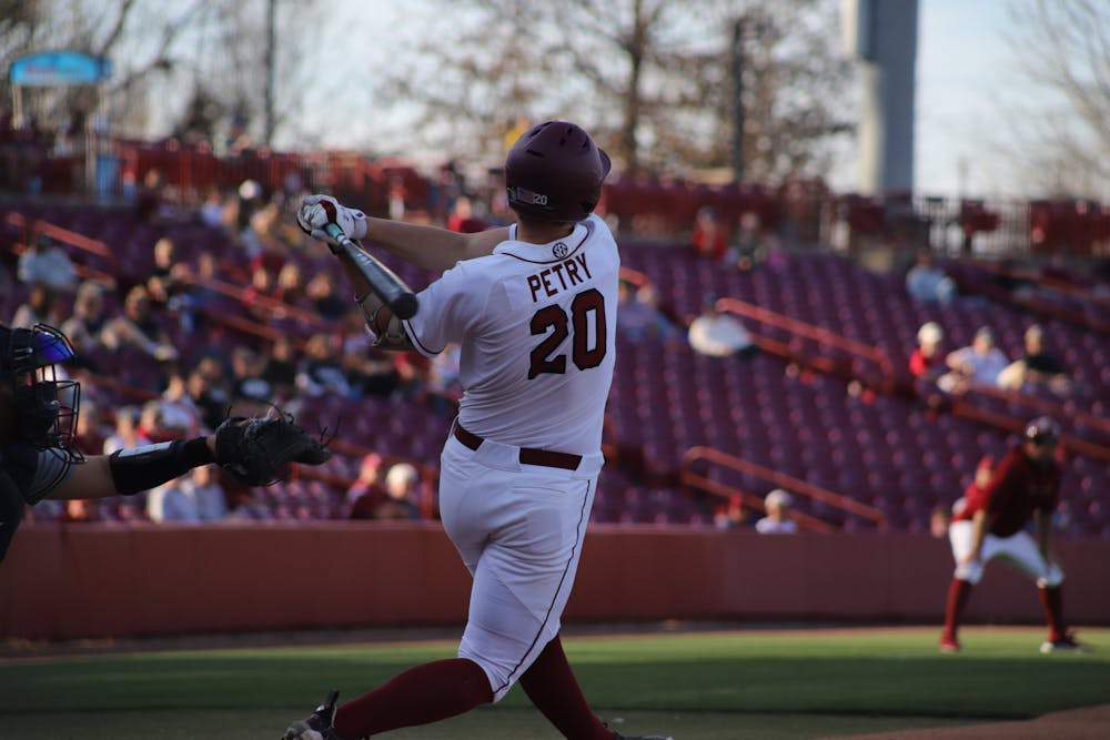 <p>FILE—Freshman outfielder Ethan Petry up to bat for the South Carolina Gamecocks against Queens on Feb. 22. South Carolina secured its first shutout of the season with a 12-0 win, making this its fifth game in a row with double-digits scoring.</p>