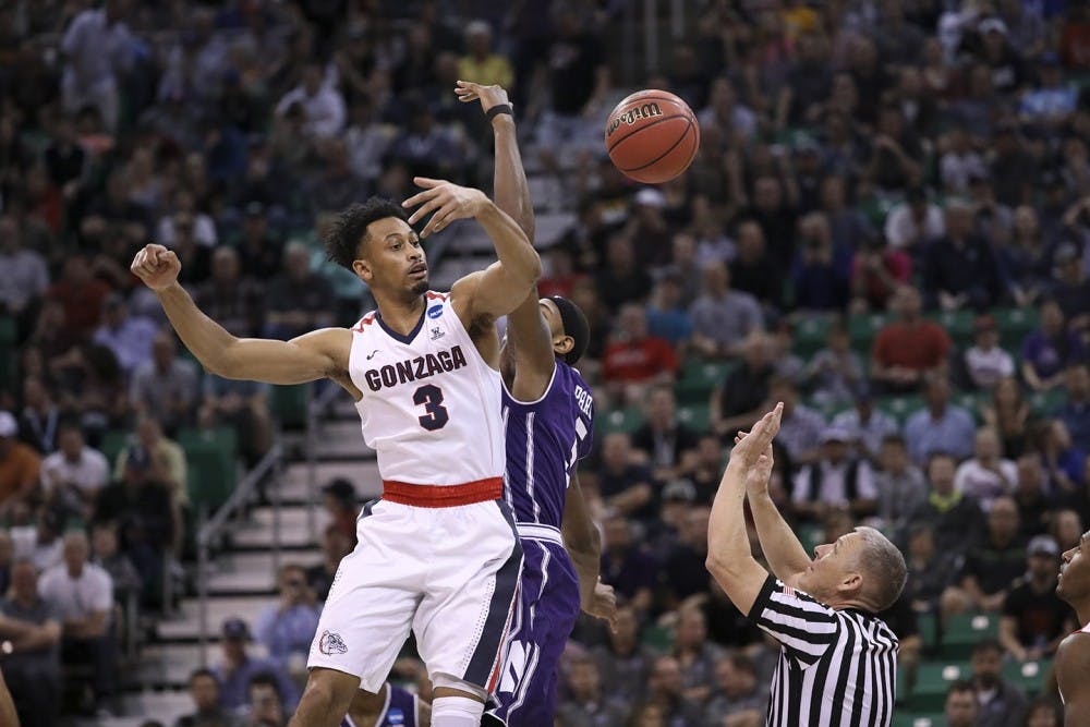 Gonzaga&apos;s Johnathan Williams (3) gets the tip-off over Northwestern&apos;s Dererk Pardon during the first half in the second round of the NCAA Tournament at Vivint Smart Home Arena in Salt Lake City on Saturday, March 18, 2017. Gonzaga advanced, 79-73. (Armando L. Sanchez/Chicago Tribune/TNS)