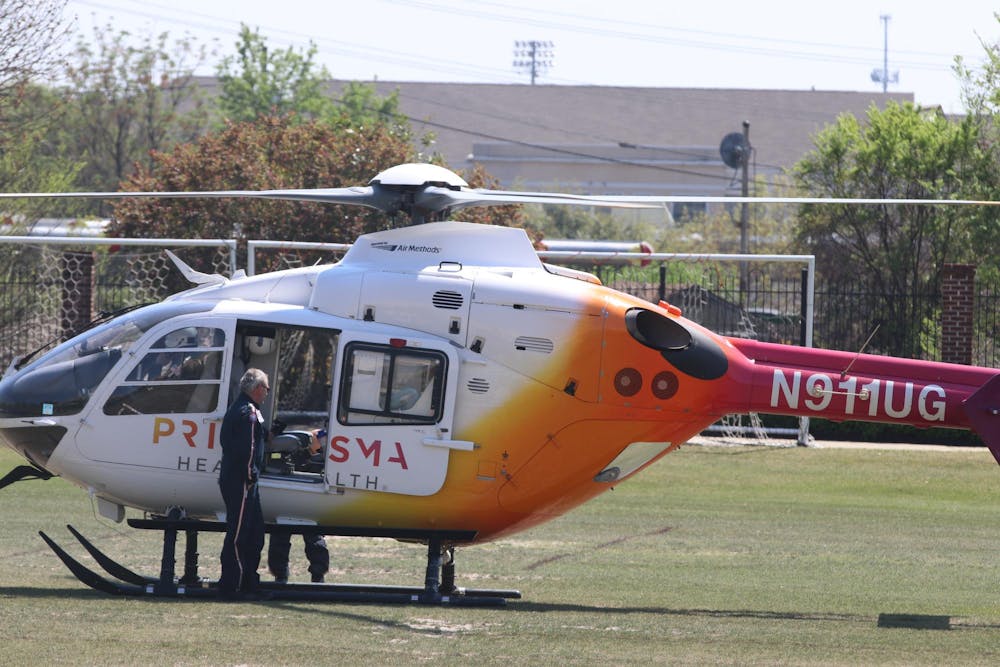<p>A LifeNet South Carolina Air Methods helicopter begins landing on one of the Strom outside fields. The helicopter was brought as part of the Gamecock Emergency Medical Students’ event on March 27, 2026.</p>