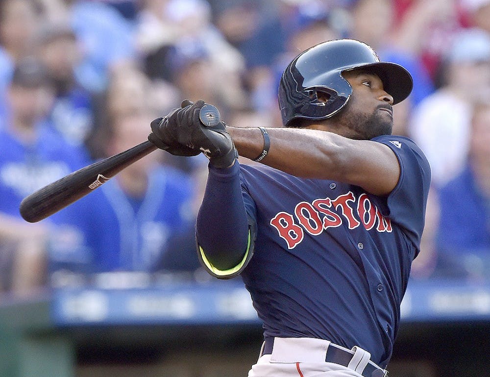 The Boston Red Sox&apos;s Jackie Bradley Jr. follows through on a solo home run in the second inning against the Kansas City Royals in the second game of a doubleheader on Wednesday, May 18, 2016, at Kauffman Stadium in Kansas City, Mo. (John Sleezer/Kansas City Star/TNS)