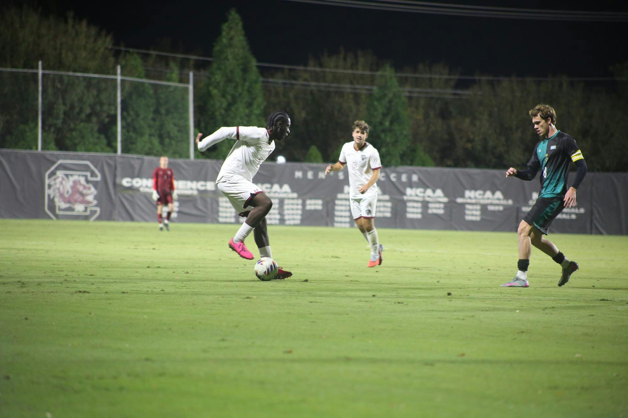 Junior midfielder Isaiah Whittaker-Francis looks for a way around the Coastal Carolina player at Eugene E. Stone III Stadium on Oct. 26, 2025. The Gamecocks achieved three points after the match.