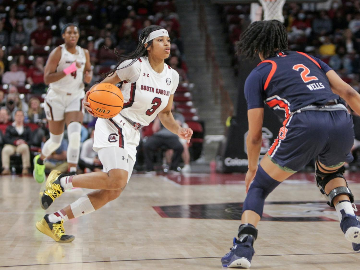 Senior guard Destanni Henderson works her way around a defender during during a game on Feb. 17, 2022 at Colonial Life Arena in Columbia, SC. The Gamecocks beat Auburn 75-38.