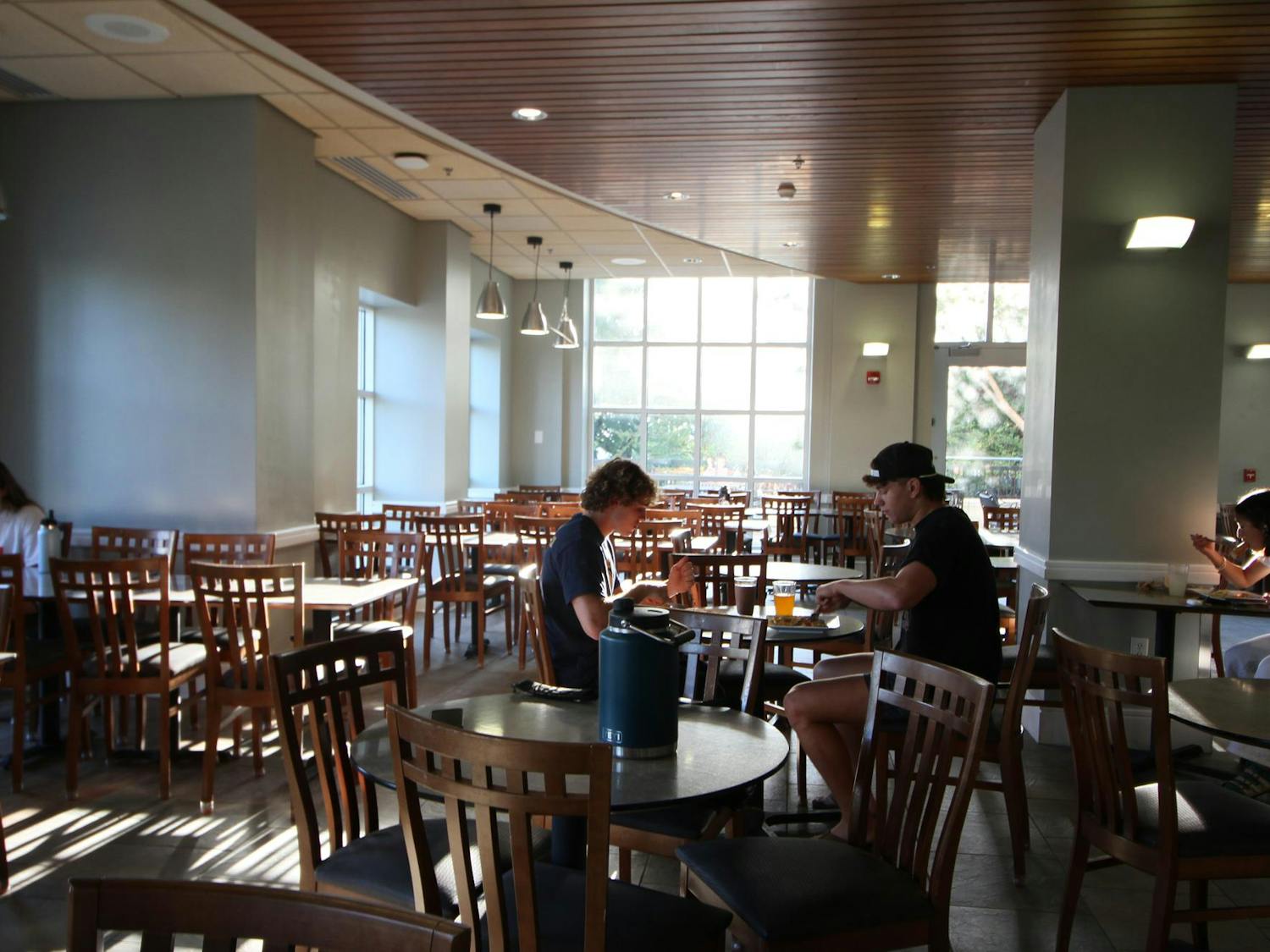 Students sit down to eat at the University of South Carolina’s Honeycomb Café on Oct. 6, 2024. The dining hall served items such as meatball subs, chicken parmesan and beef goulash on that day.