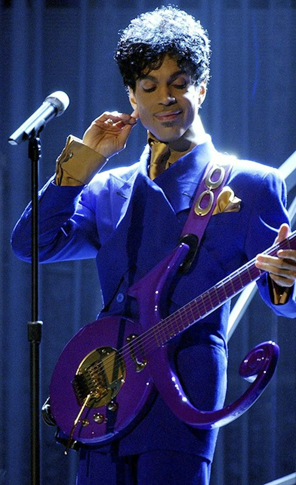 Prince performs &quot;Purple Rain&quot; as the opening act during the 46th Annual Grammy Awards show on Feb. 8, 2004 at the Staples Center in Los Angeles. The Prince estate and its new partners at Sony Legacy have announced a new plan to issue a batch of old videos every week through mid-December from the Minnesota music legendâ€™s 1995-2010 era, a period of recordings that Sony now oversees and is marketing again. (Richard Hartog/Los Angeles Times/TNS) 