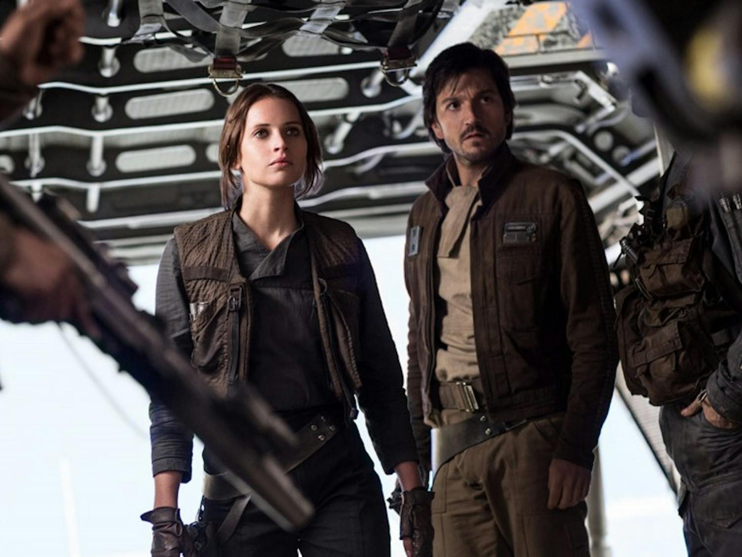 Felicity Jones as Jyn Erso and Diego Luna as Cassian Andor in the film 