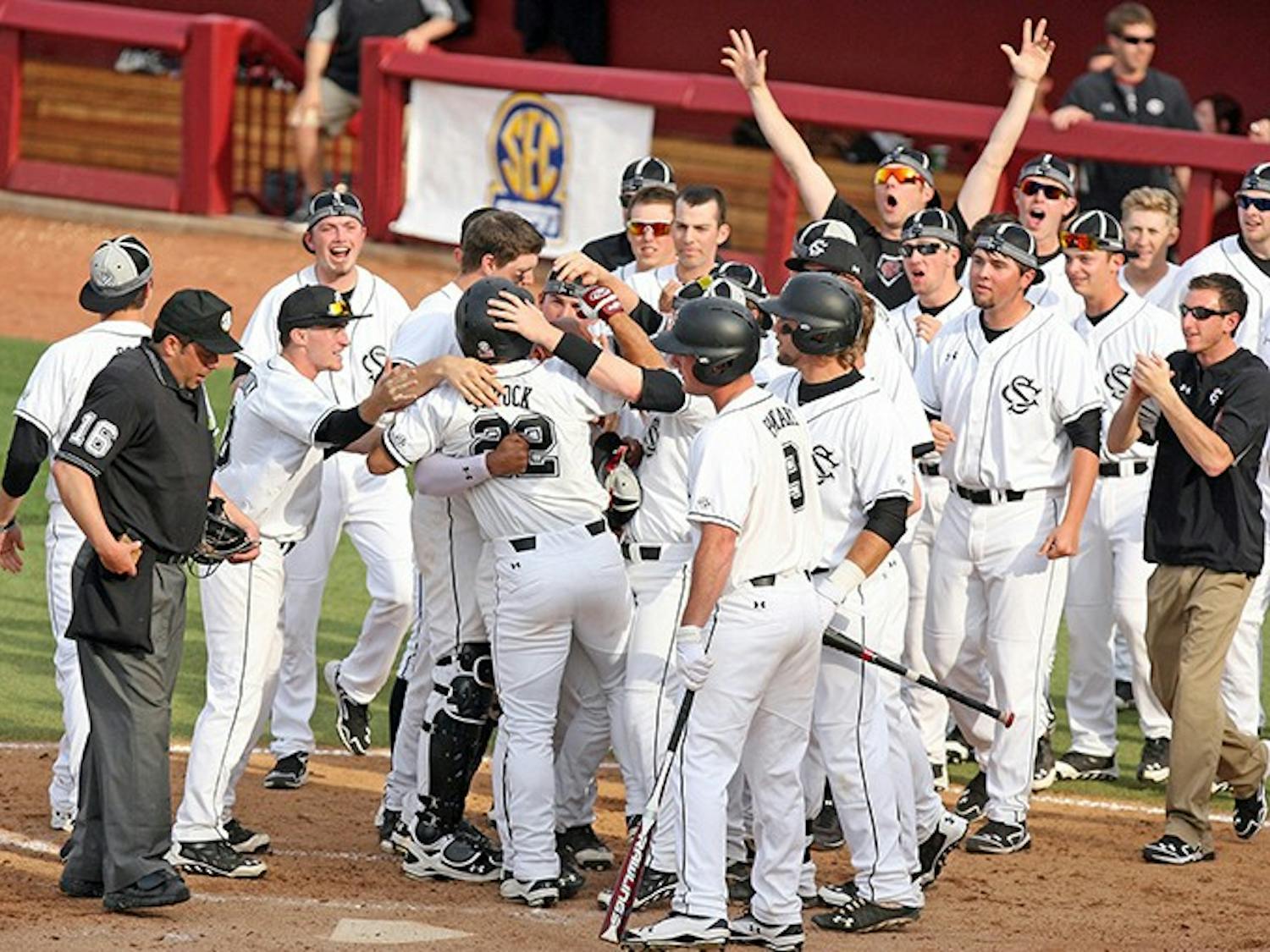South Carolina's Max Schrock delivers a pinch-hit, game-tying two-run home run in the bottom of the ninth inning against Mississippi in the first game of a doubleheader at Carolina Stadium in Columbia, S.C., Saturday, March 15, 2014. The host Gamecocks won the opener, 5-4, in 10 innings. (Dwayne McLemore/The State/MCT)