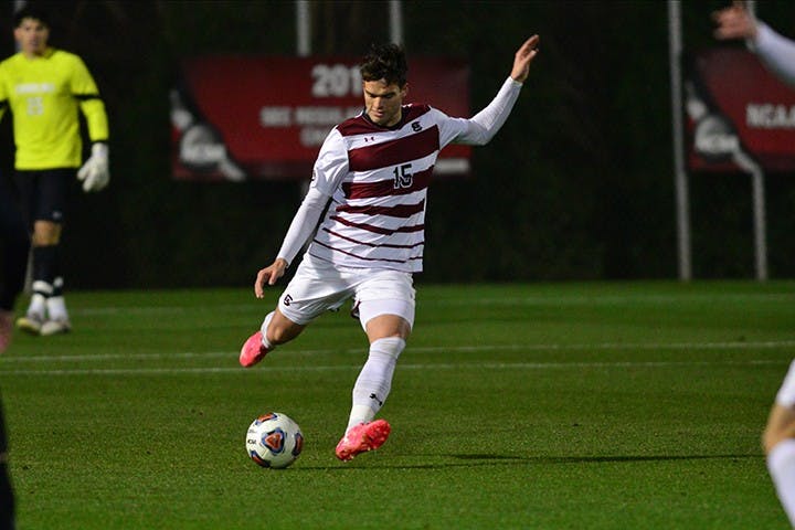 Sophomore defender Mike Roby kicks the ball during the Gamecocks’ win over USC Upstate Wednesday. South Carolina won 2-1 in overtime.