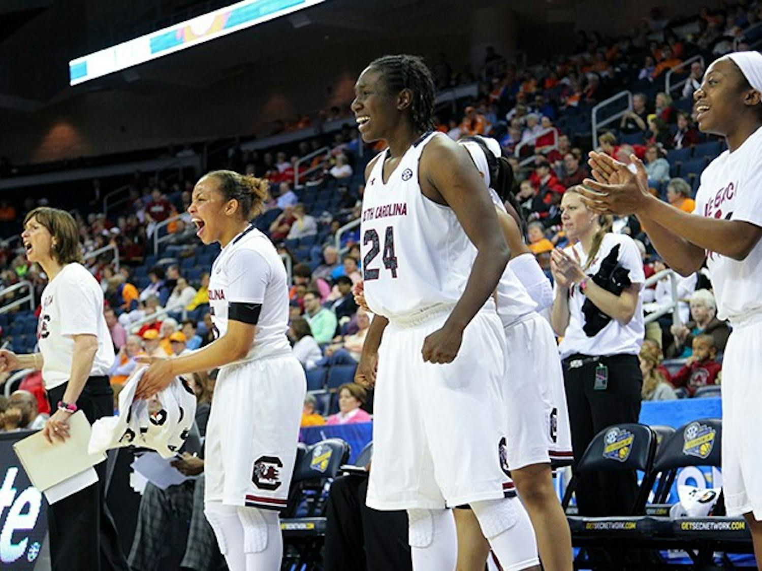 South Carolina Gamecocks celebrate after beating Georgia to advance in SEC tournament play at The Arena at Gwinnett Center, in Duluth, Ga., Friday, March 7, 2014. South Carolina won 67-48. (Tracy Glantz/The State/MCT)