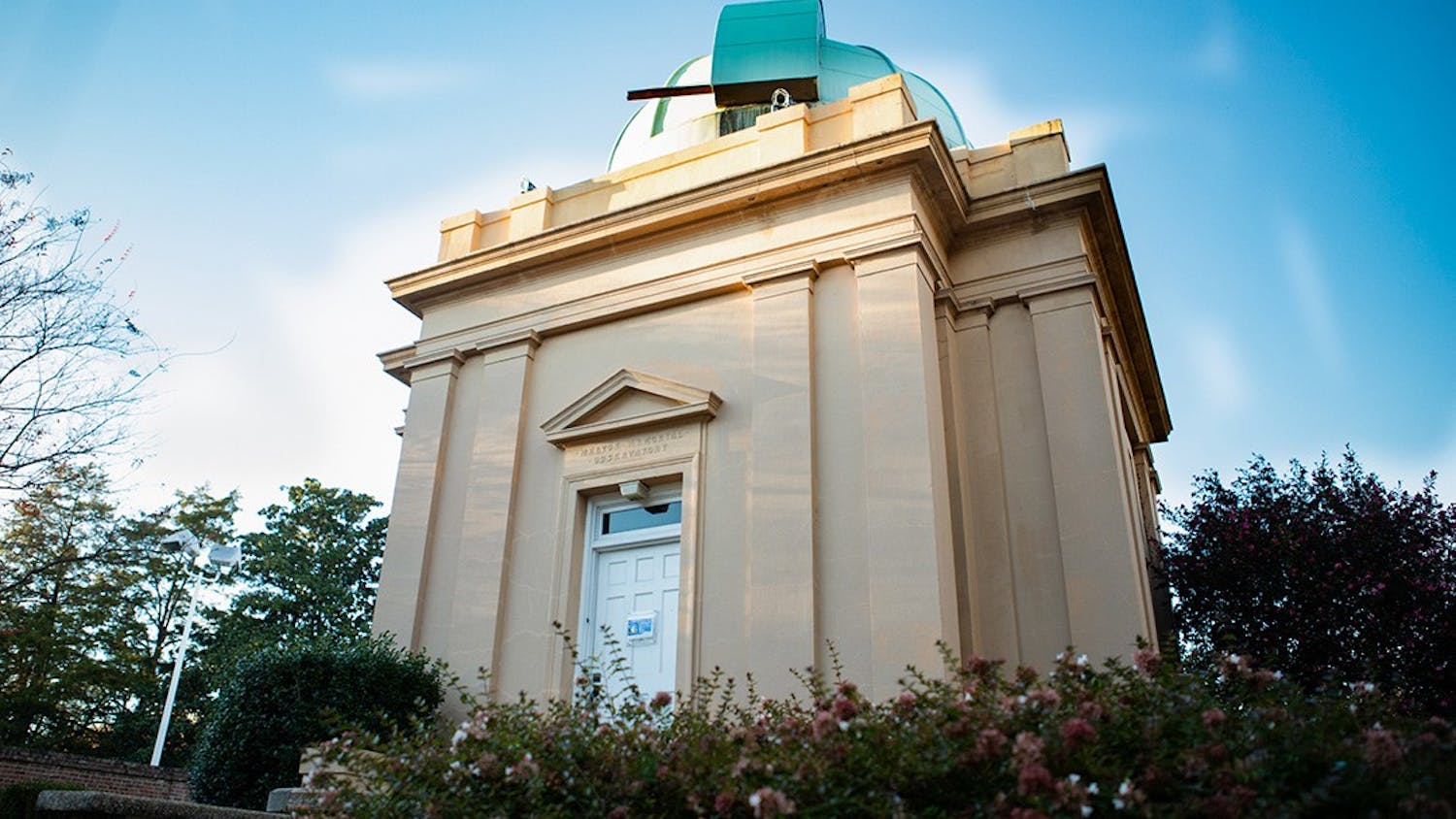 The sun sets over the Melton Observatory on Greene Street on a clear evening. The observatory telescope is open to the public on Monday from 7 p.m. to 9 p.m., and students from all majors volunteer to maintain the instrument that can capture distant planets and stars.