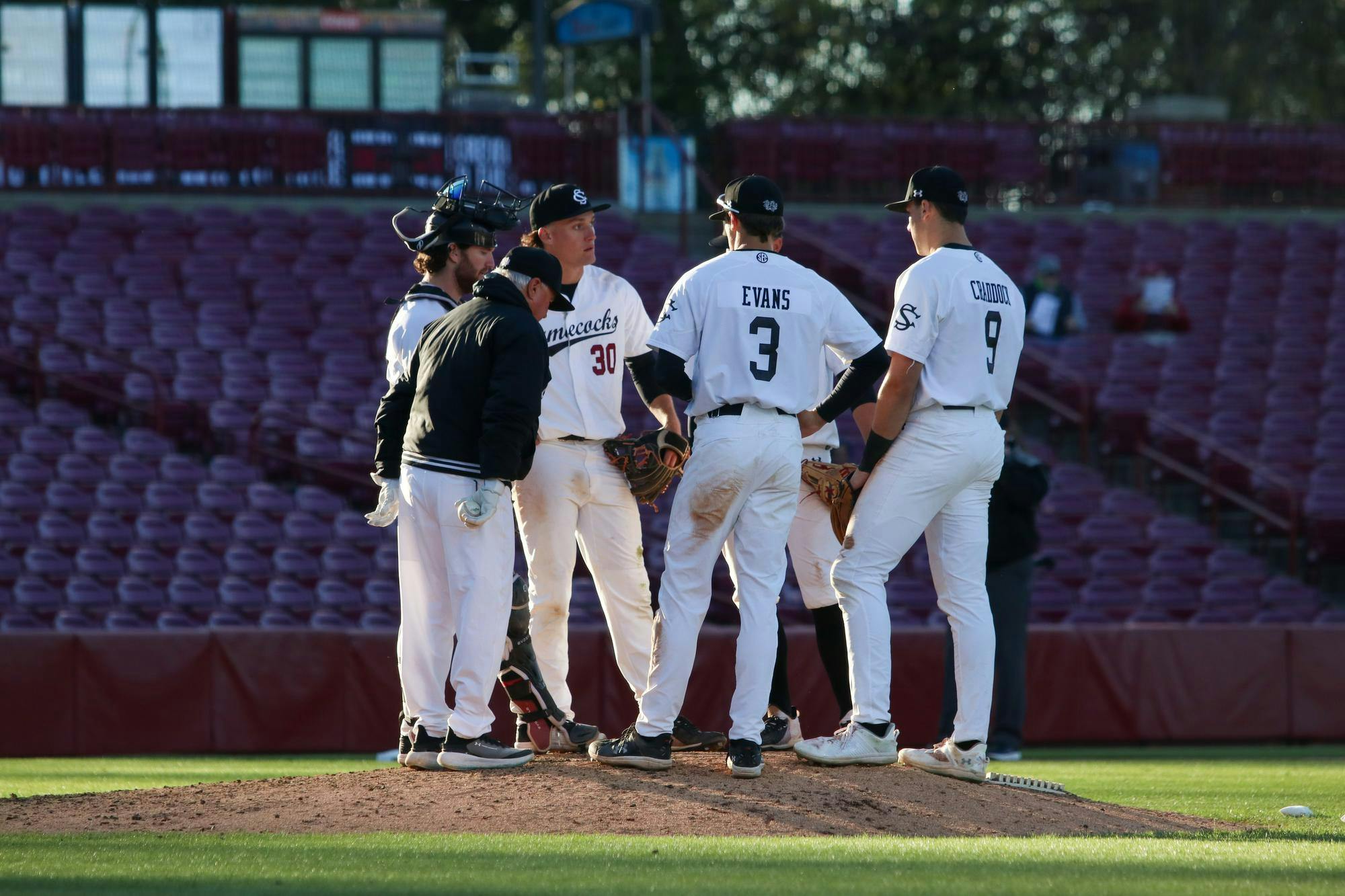 FILE —&nbsp;The Gamecocks meet on the pitcher’s mound with head coach Paul Mainieri to strategize for the next innings against Charlotte at Founders Park on March 17, 2026. Associate head coach and hitting coach Monte Lee has taken over as interim head coach after South Carolina parted ways with Mainieri in the 2026 season.