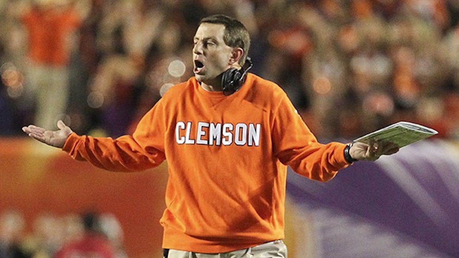 Clemson head coach Dabo Swinney gestures from the field in the first quarter against Ohio State in the Discover Orange Bowl at Sun Life Stadium in Miami Gardens, Fla., on Friday, Jan. 3, 2014. (Al Diaz/Miami Herald/MCT)