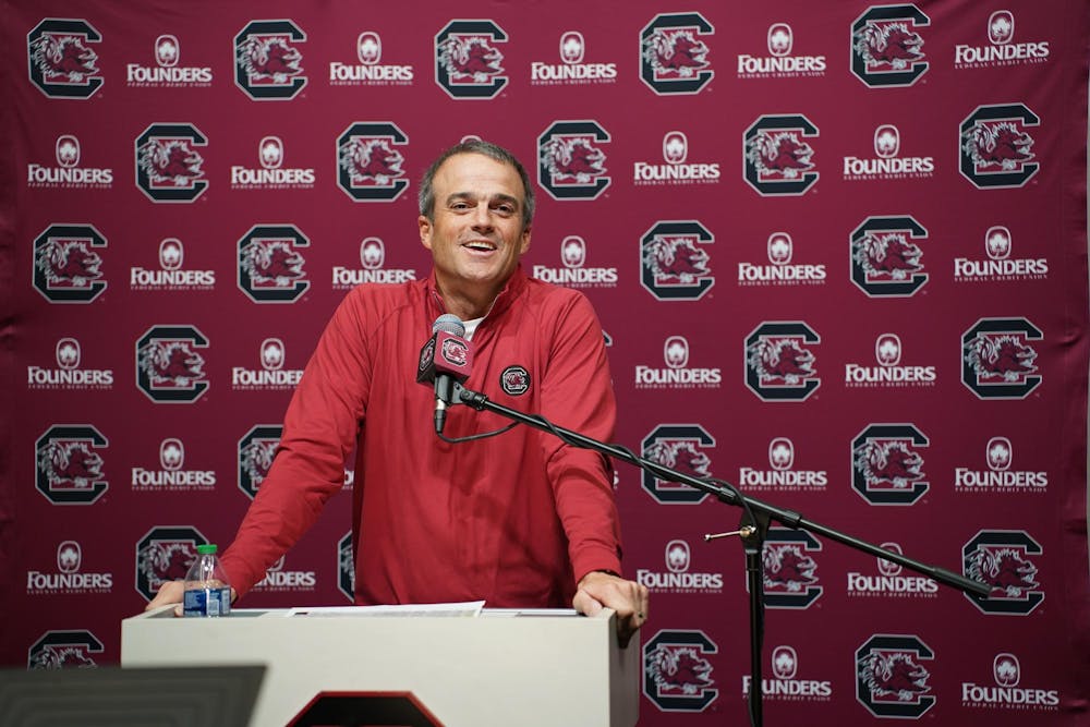 <p>FILE — Head coach Shane Beamer speaks to members of the media at the Long Family Football Operations Center on Nov. 14, 2023. Beamer recently hired wide receivers coach Mike Furrey and run game coordinator and tight ends coach Shawn Elliott to the Gamecocks' football staff for the upcoming season.</p>