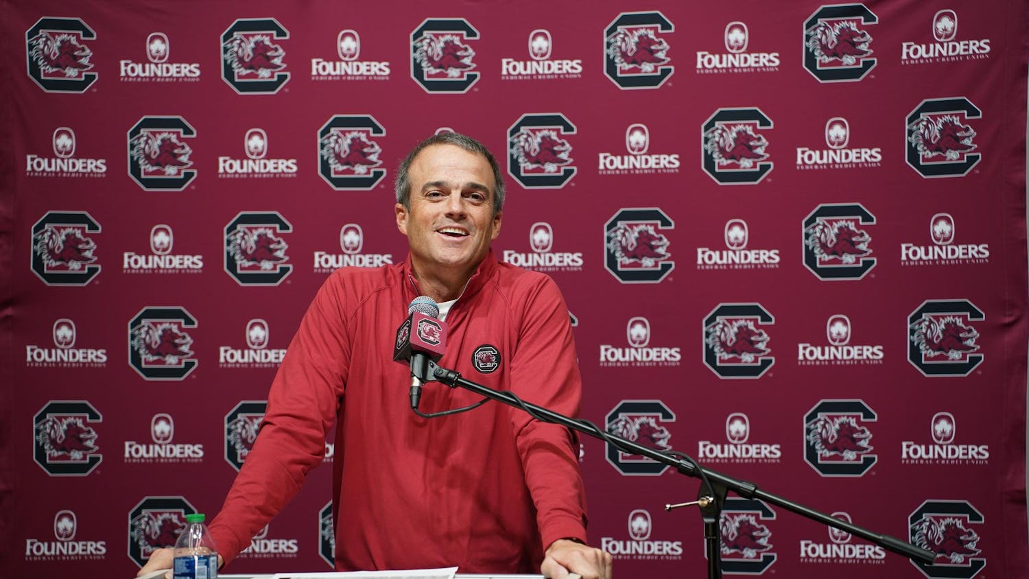 FILE — Head coach Shane Beamer speaks to members of the media at the Long Family Football Operations Center on Nov. 14, 2023. Beamer recently hired wide receivers coach Mike Furrey and run game coordinator and tight ends coach Shawn Elliott to the Gamecocks' football staff for the upcoming season.
