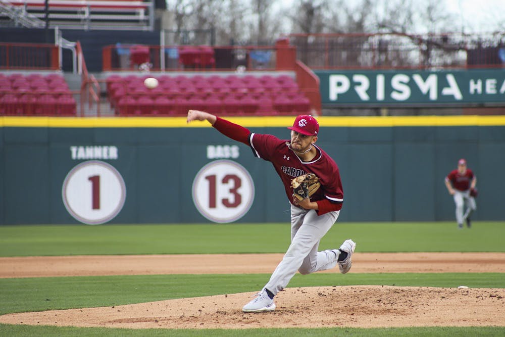 <p>Senior pitcher Noah Hall pitches for team Garnet in the first scrimmage of the season on Jan. 23, 2023. Hall is returning to play for South Carolina after making the 20th-round pick by the Milwaukee Brewers in July 2022.</p>