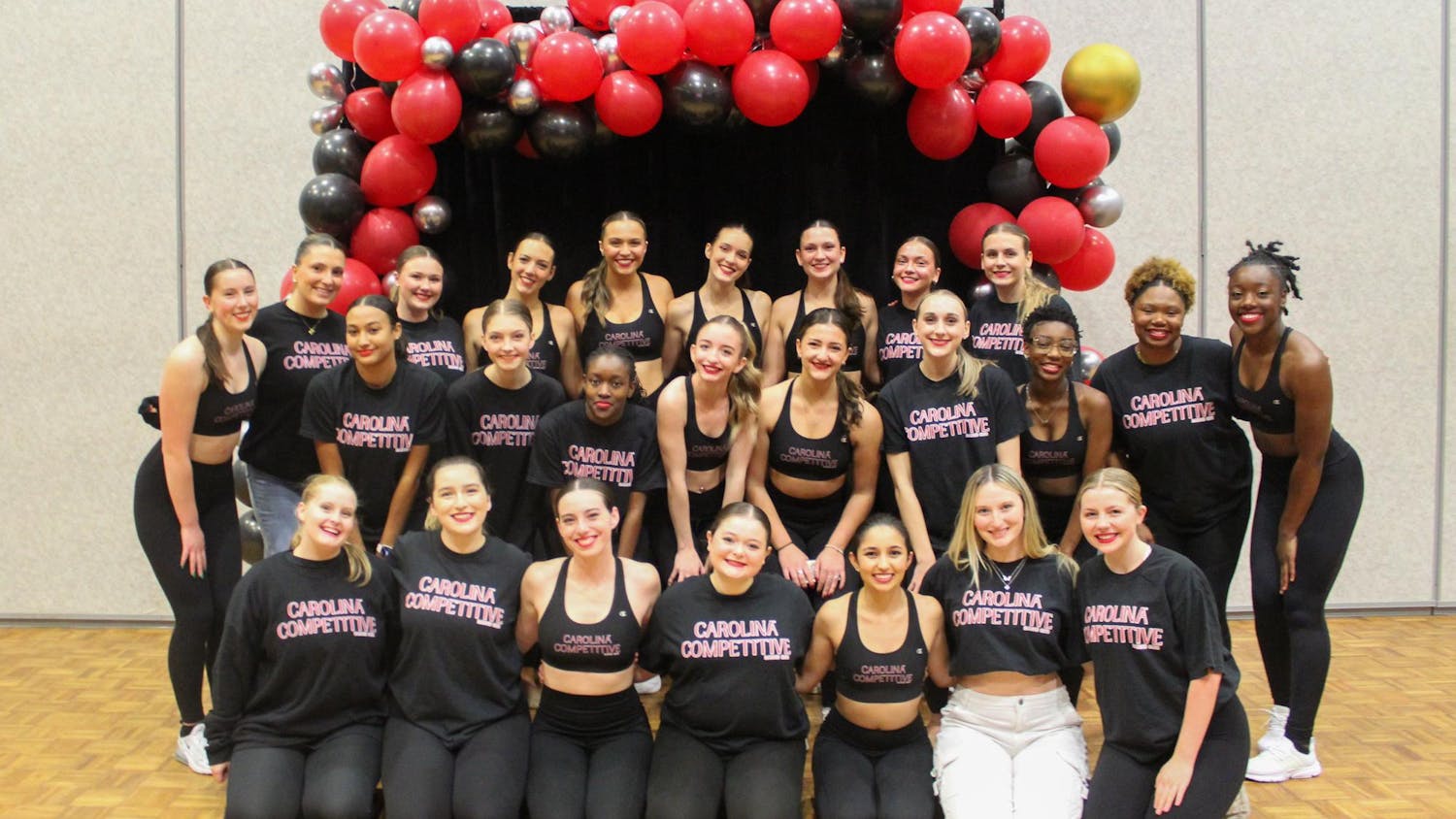 The Carolina Competitive Dance Club poses for a group picture on Dec. 5, 2023, in the Russell House Ballroom. The 2023-24 academic year is the club's first year on campus.