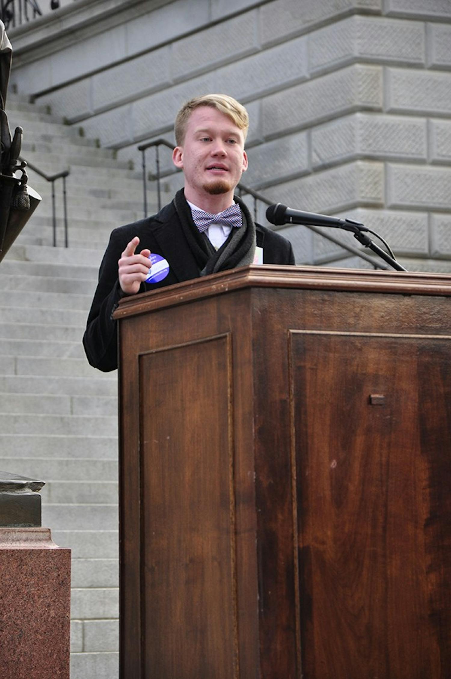 Former Bisexual, Gay, Lesbian, Straight Alliance President Zac Baker speaks at Tuesday's rally.