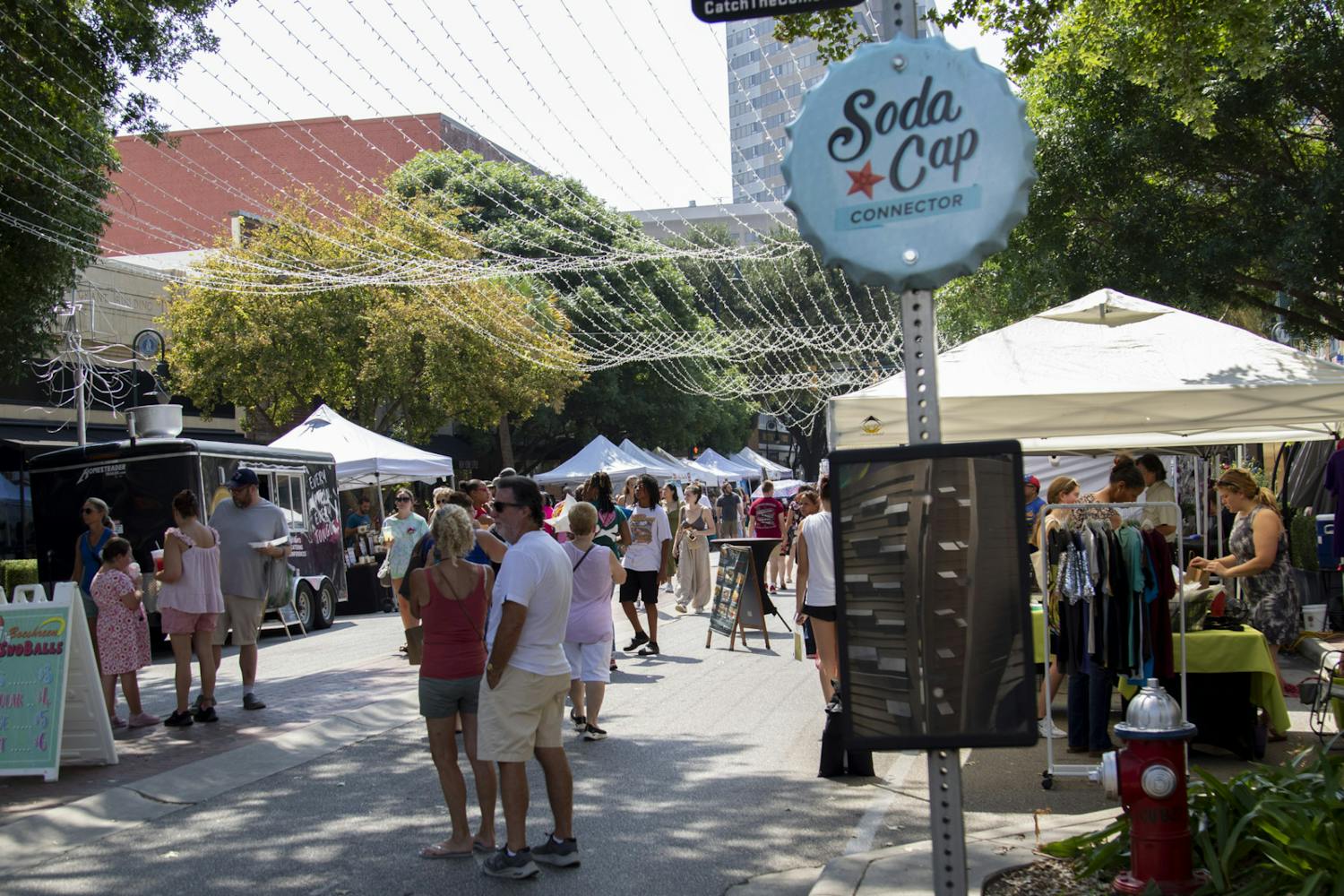 FILE&nbsp;—&nbsp;&nbsp;The Soda Cap Connector sign stands on Main St. during Soda City Market on Aug. 26, 2023. The Soda Cap Connector is a $1 bus line that brings commuters to Columbia's attractions.&nbsp;