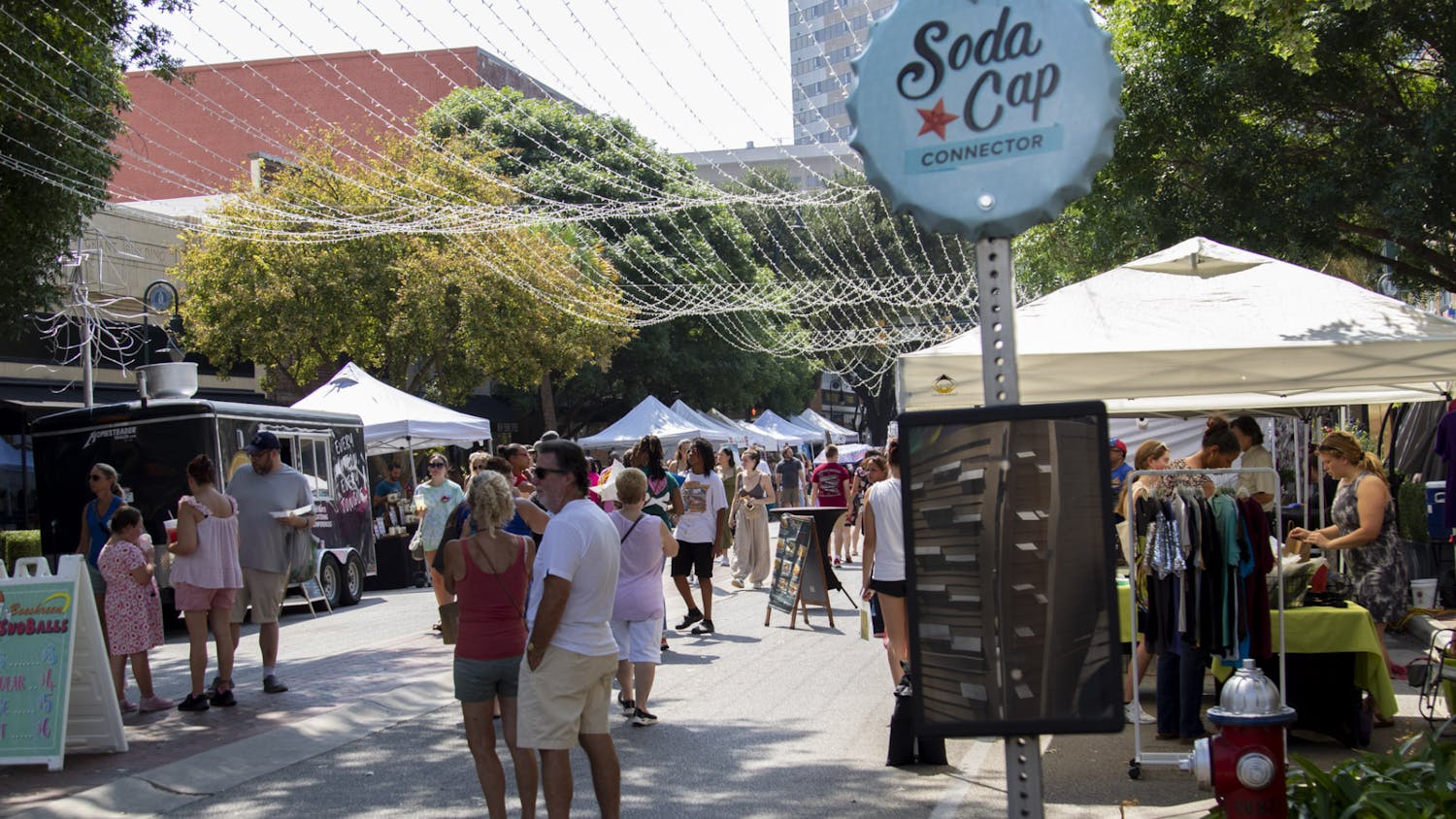 FILE — The Soda Cap Connector sign stands on Main St. during Soda City Market on Aug. 26, 2023. The Soda Cap Connector is a $1 bus line that brings commuters to Columbia's attractions. 