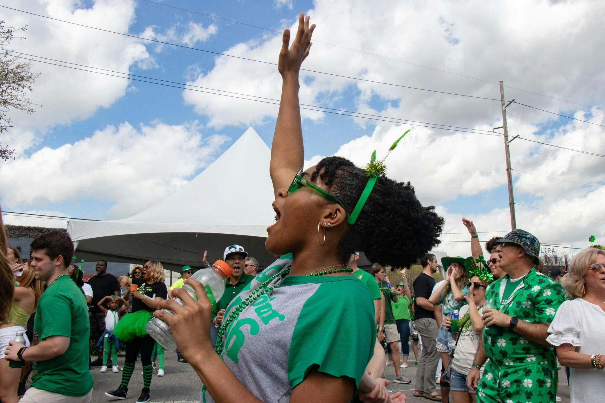 Second-year student Sydnie Taylor cheers and dances along to music performed by Master Splnta with DJ Cannon Banyon at St. Pat's in Five Points in Columbia, South Carolina, on March 16, 2024. Master Splnta and DJ Cannon Banyon kicked off the day on the Fountain Stage and performed multiple times throughout the day.