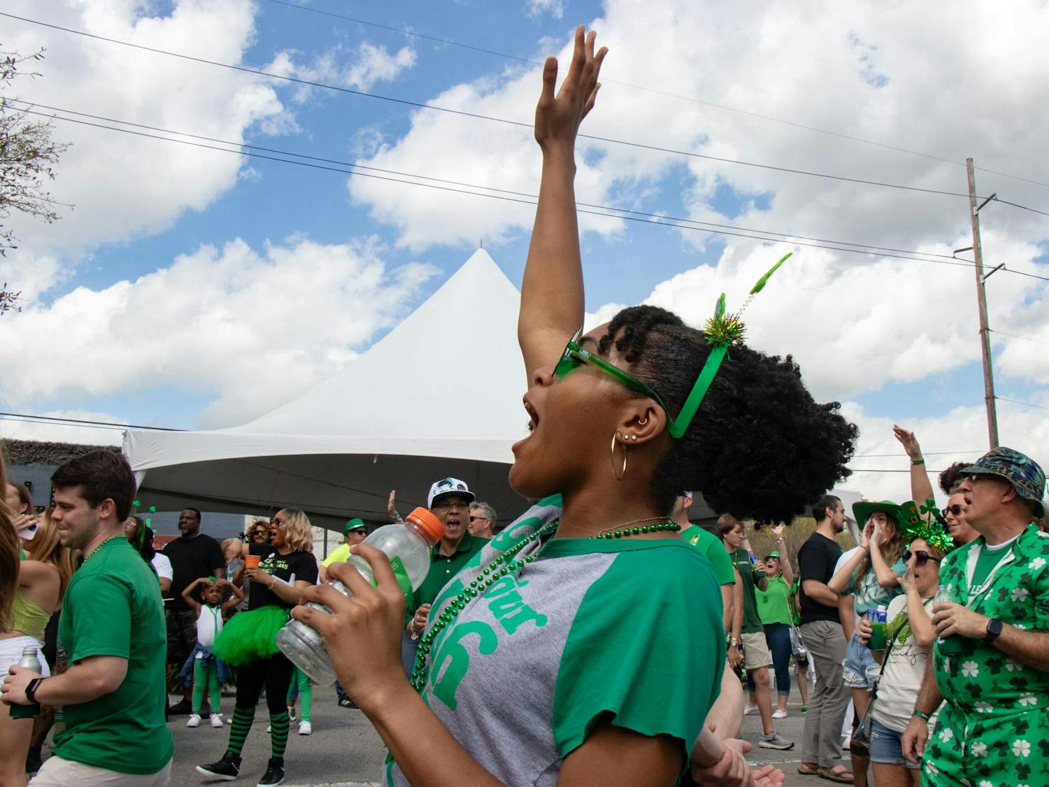Second-year student Sydnie Taylor cheers and dances along to music performed by Master Splnta with DJ Cannon Banyon at St. Pat's in Five Points in Columbia, South Carolina, on March 16, 2024. Master Splnta and DJ Cannon Banyon kicked off the day on the Fountain Stage and performed multiple times throughout the day.
