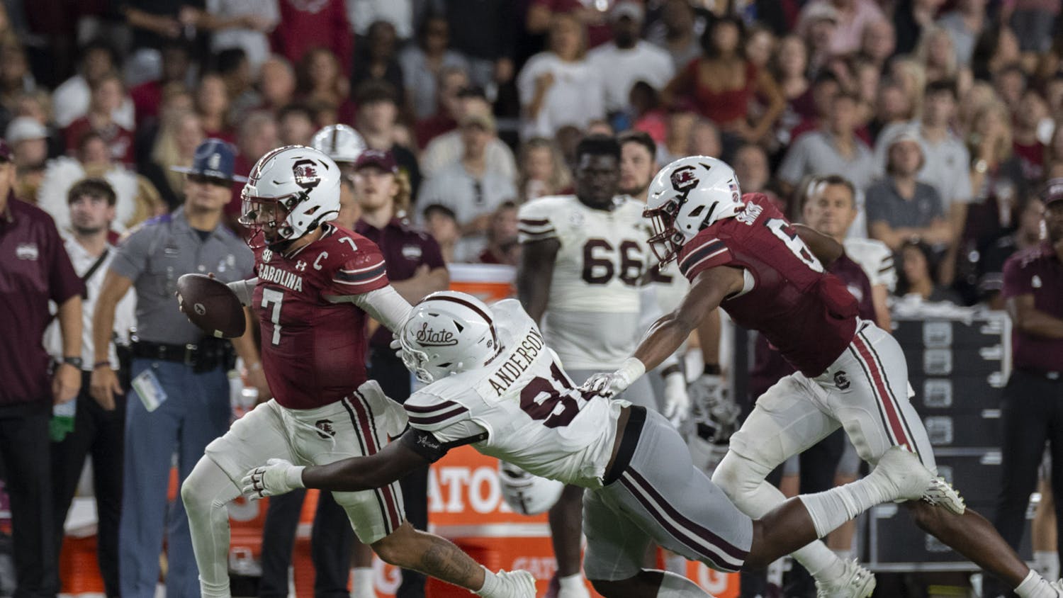 FILE — Redshirt senior quarterback Spencer Rattler runs the ball down the sideline against Mississippi State at Williams-Brice Stadium on Sept. 23, 2023. The Gamecocks defeated the Bulldogs 37-30.