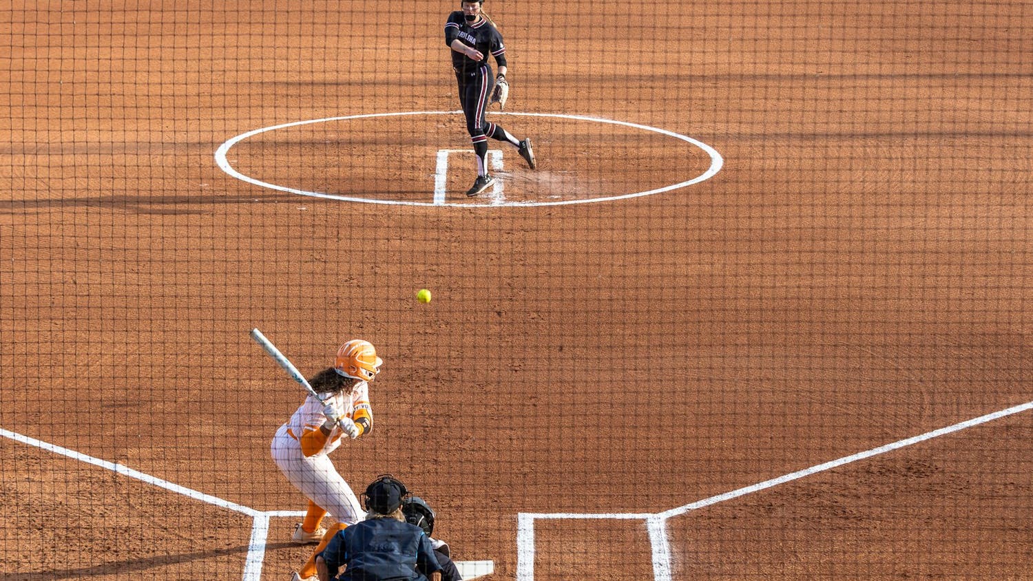 Fifth-year pitcher Alana Vawter throws a pitch in the first inning of the second game of the series against the University of Tennessee on March 24, 2024. During the three innings pitched, Vawter allowed five hits, four errors and struck out two batters.