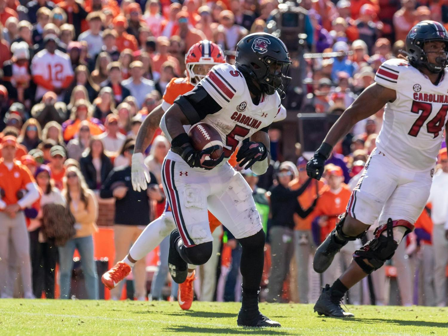 Senior running back Raheim "Rocket" Sanders carries the ball downfield against Clemson on Nov. 30, 2024, at Memorial Stadium. Sanders had 60 yards on 18 carries.