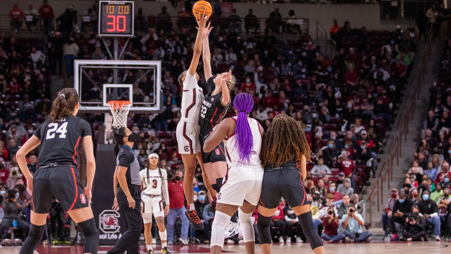 Senior forward Victaria Saxton works to gain possession of the ball during the tip-off on Dec. 22, 2021. The Gamecocks head to Mississippi to battle the Rebels on Jan. 27, 2022