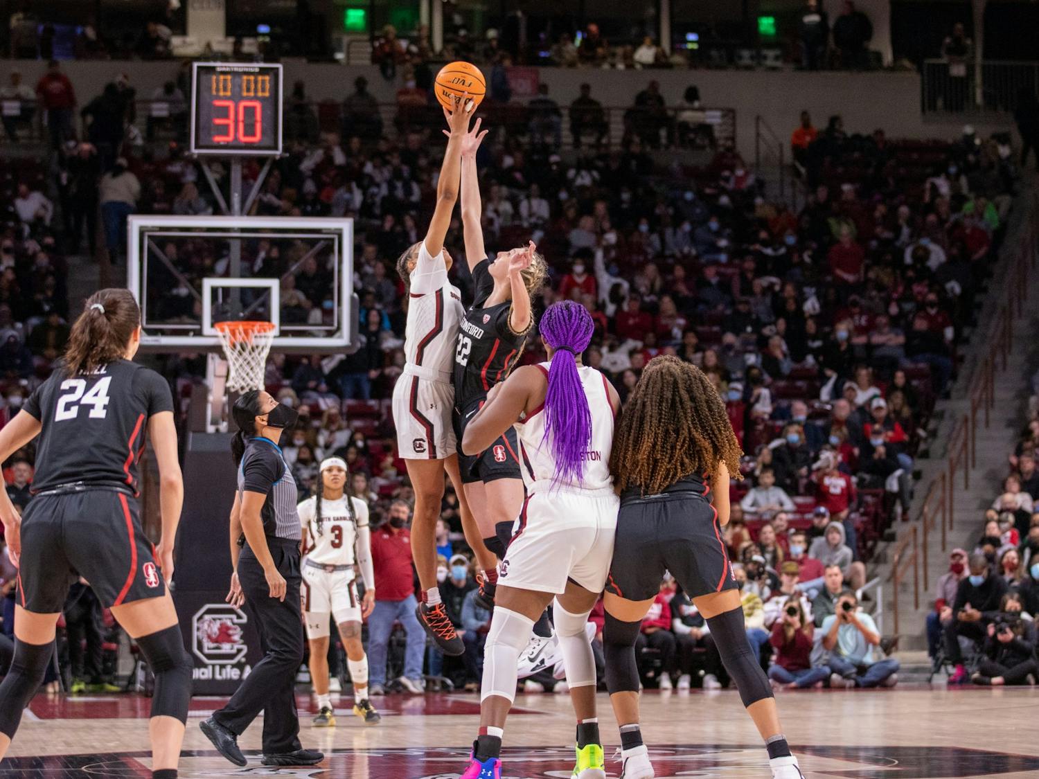 Senior forward Victaria Saxton works to gain possession of the ball during the tip-off. The Gamecocks beat Stanford 65-61. 
